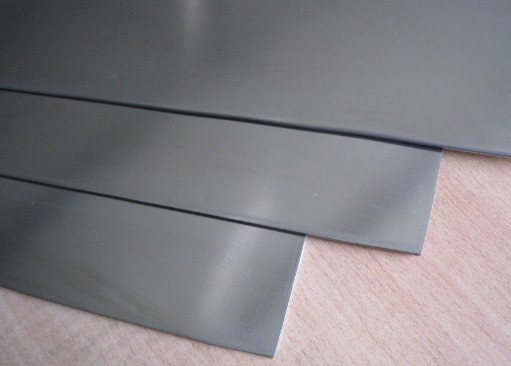 What are the manufacturing processes for titanium plates